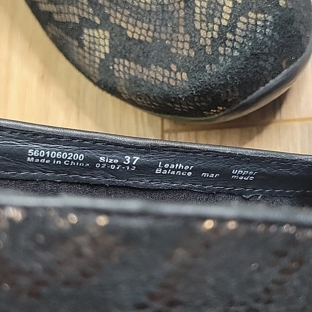 Dansko Olivia Bronze Snake Print Slip Ons